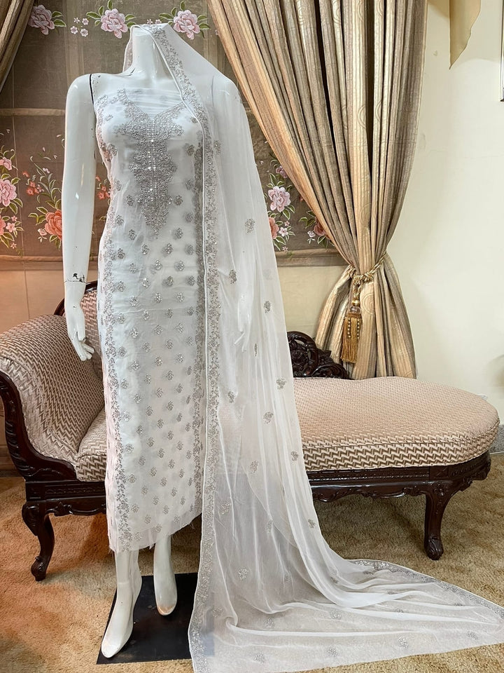Off white colour Beautiful Silver Embroiderd work  suit collection 2pc shirt & Duppata